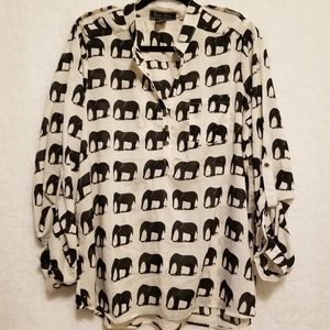 Blouse with black elephants all over